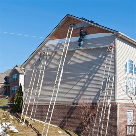 metal siding on house over brick|siding over brick exterior.